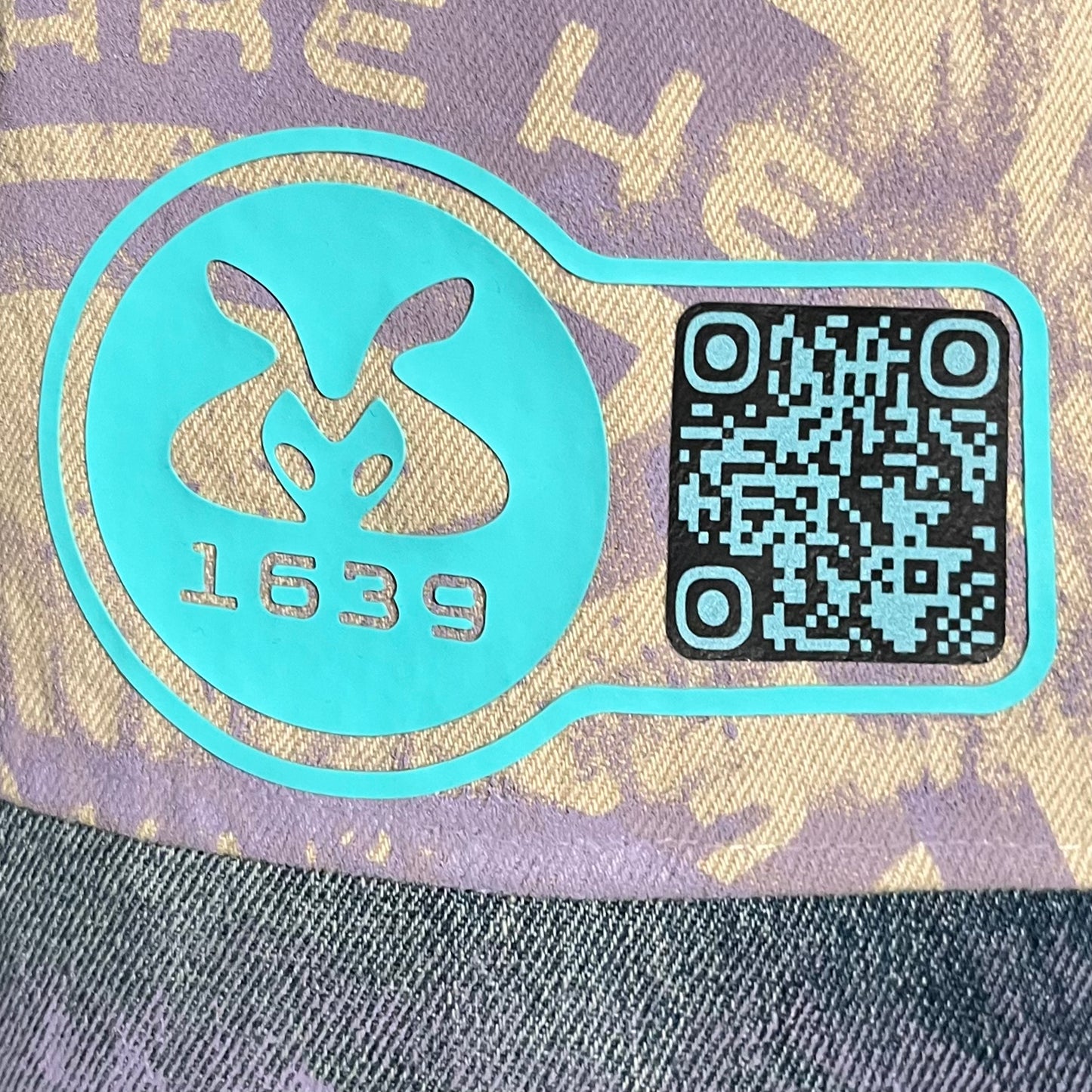 Moonworld X Athene Bytes #1639 - Saturn Explorer (Upcycled Denim Pants Size L)